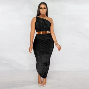 Elegant black one-shoulder ruched bodycon dress featured with a metallic gold belt.