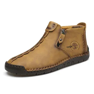 Handmade men's high-top leather shoes in tan featuring side zipper and tree logo