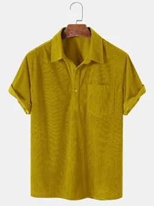 Detail of men's casual mustard yellow corduroy short sleeve polo shirt with pocket