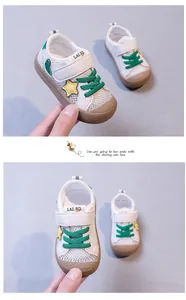 Detail view of toddler mesh walking shoes with star decoration and green laces