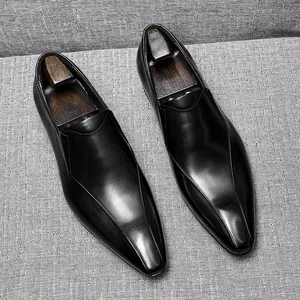 Elegant men's black polished leather pointed-toe loafers for business and formal wear.