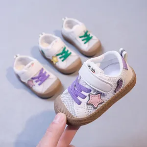 Breathable mesh baby walking shoes with star detail and adjustable Velcro strap