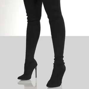 Elegant black knitted over-the-knee sock boots with pointed toe and stiletto heels.