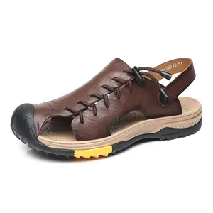 Casual men's brown leather beach sandals with protective closed-toe and durable sole
