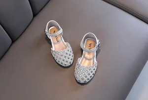 Silver rhinestone hollow-out princess shoes for girls featuring buckle ankle straps