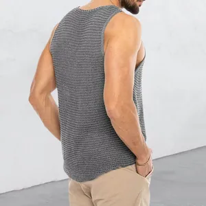 Detail view of men's grey knitted sleeveless vest showing breathable knit pattern.
