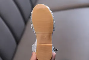 Close-up detail of durable non-slip rubber sole for silver glitter princess shoes