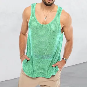 Close-up of men's loose knit green tank top showing breathable mesh texture