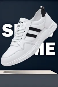 Close-up view showing the leather texture and side stripes of men's white sneakers