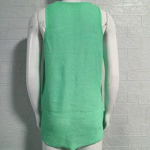 Back view detail of men's loose knitted sleeveless tank top in vibrant green color
