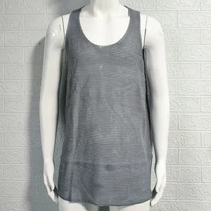 High-detail texture of grey men's loose knitted mesh tank top for summer sports