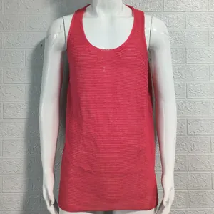 Close-up of men's coral knitted tank top with breathable mesh texture and round neck.