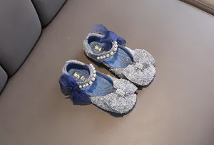 Sparkly blue girls' princess shoes with tulle bows and pearl straps for performance