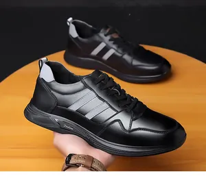 Close-up view of men's black leather elevator sneakers with hidden height increase design