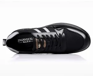 Top view of black breathable mesh elevator sports shoes with lace-up detail.