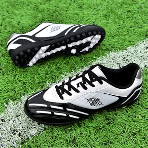 Scarpe da calcio professionali antiscivolo per bambini con tacchetti per erba sintetica