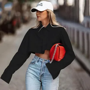 Trendy black cropped long-sleeve shirt for women, perfect for casual street style outfits.