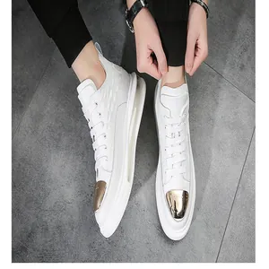Detailed shot of white leather high-top shoes for men with air cushion and metal toe