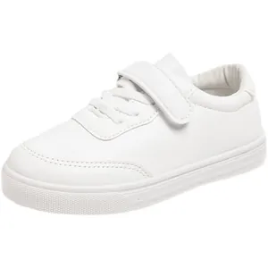 Classic white children's school sneakers with hook and loop closure for boys and girls
