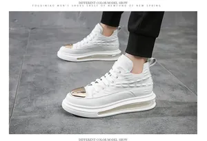 White cowhide high-top sneakers with gold metal toe cap and air cushion sole.