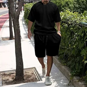 Men's summer casual loose two-piece set with black short sleeve T-shirt and shorts.