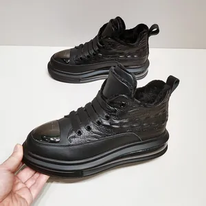 Detail of black leather high-top men's sneakers with air cushion and fur lining