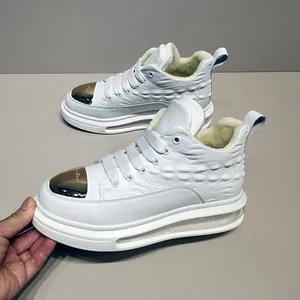 Premium white high-top leather sneakers featuring a gold toe cap and warm fleece lining