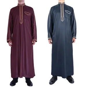 Detailed view of burgundy and dark grey traditional thobes with elegant embroidered patterns.