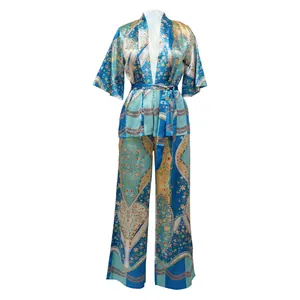 Elegant floral print imitation silk two-piece set featuring wrap top and wide-leg pants