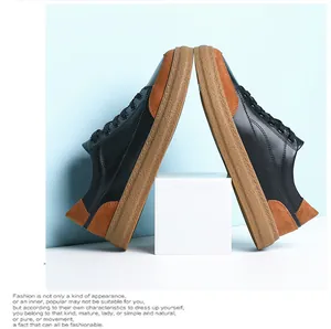 Vue détaillée de baskets en cuir pour hommes au design rétro bas avec blocs de couleurs