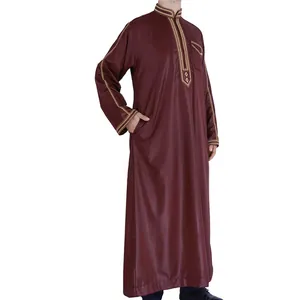 Detail view of a traditional men's burgundy robe with intricate golden embroidery on collar