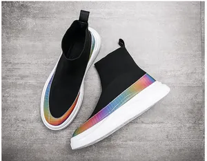 Black high-top flyknit sock sneakers with rainbow gradient detail and white sole