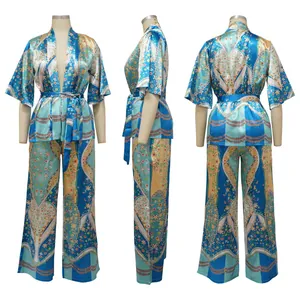Detailed front, side, and back view of a blue satin floral print two-piece lounge set