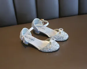 Elegant silver sequined girls' dress shoes featuring delicate bowknot and rhinestones.