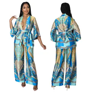 Front and back detail of vibrant floral print faux silk robe and wide-leg pants set
