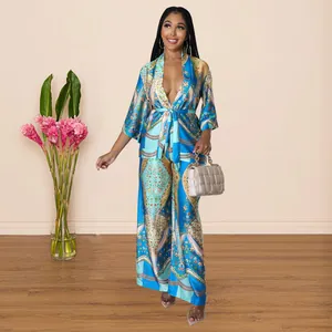 Detailed view of the blue faux silk printed kimono top and wide-leg trousers set