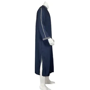 Side view of navy blue men's traditional long robe with embroidered cuffs and side slit