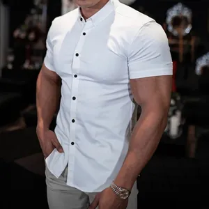 Close-up of white short-sleeve muscle fit stretch shirt with black buttons