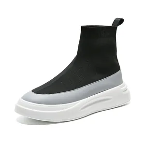 Men's black fly-knit high-top sock sneakers with breathable grey and white soles.