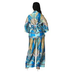 Back view of a colorful silk-like printed two-piece set featuring wide-leg pants