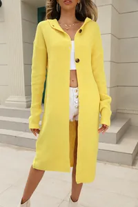 Detail view of a long-sleeved hooded knit cardigan in vibrant yellow with button details