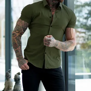 Macro view of olive green muscle fit shirt showing the athletic tailoring and stretch fabric