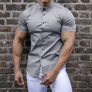 Close-up view of grey men's muscle fit short sleeve stretch button-down shirt detail
