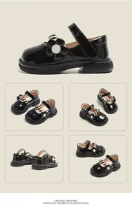 Detailansicht der schwarzen Lackleder-Lauflernschuhe mit Blumenverzierung für Mädchen.