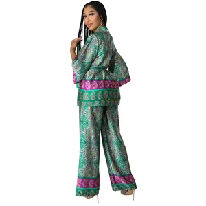 Back view of women's elegant faux silk paisley print two-piece set with wide-leg pants