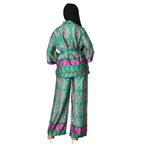 Detailed back view of women's green paisley print satin two-piece set with wide-leg pants