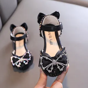 Eleganti scarpe da principessa nere per bambine con fiocco di strass