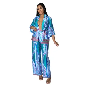 Elegant women's two-piece floral satin set with kimono top and wide-leg trousers