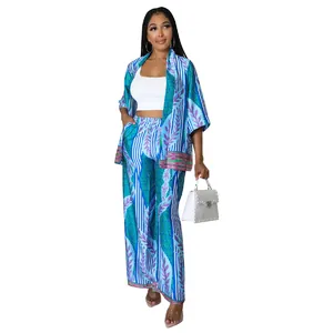 Detailed full view of women's faux silk printed two-piece set featuring wide-leg pants