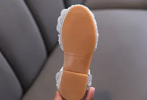 Close-up of anti-slip rubber sole for girls' sparkly princess shoes showing size 26